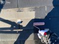 屋根塗装 色褪せや汚れ、カビなどの劣化が見られた既存の大屋根。紫外線の影響を抑制してくれるラジカル制御形塗料を使用しました。[屋根の下塗りの様子]