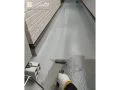 ベランダ塗装の様子 防水機能を高めるため、ベランダの防水塗装も行いました[ベランダ塗装 上塗り]