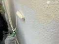 外壁塗装の様子 外壁はツートンデザインで、しっかり高圧洗浄した後に塗装を行いました[外壁 上塗り]