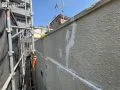 外壁塗装の様子 クラックが発生していた部分をメンテナンスし、その上から塗装を行いました[外壁 下地処理]