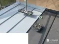 屋根塗装[板金屋根 下塗りの様子]