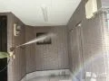 外壁塗装の様子① 色味を変えずに、落ち着きと上品さが際立つ仕上がりとなりました。[高圧洗浄]