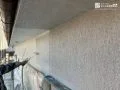 外壁塗装② 高圧洗浄から上塗りまで丁寧に行い、爽やかなオフホワイトの外壁に仕上がりました。