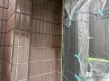 外壁塗装➁ 外壁の素材に合わせて適切に塗装を行い、美観と耐久性を高めました。[外壁タイル部・中塗り]