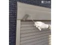 シャッターBOX塗装の様子 鉄部のため、しっかりケレンした後に塗装を行いました[シャッターBOX_下塗り]