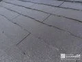 スレート屋根の塗装の様子 コケ等が既に生えていた外壁を塗装メンテナンスしました[屋根塗装_中塗り]