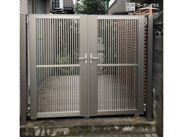 大きな石組を解体して外からお庭をつなげたウッドデッキ工事