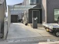ライフスタイルに合わせて収納庫も設置した駐車スペース工事