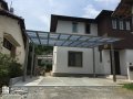 リンクストーンとフラットカーポートの美しい佇まいのファサード