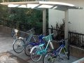 お子様の新品の自転車を雨から守るサイクルポート設置工事