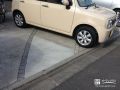 土間コンクリートで補修した自然な仕上がりの駐車スペース